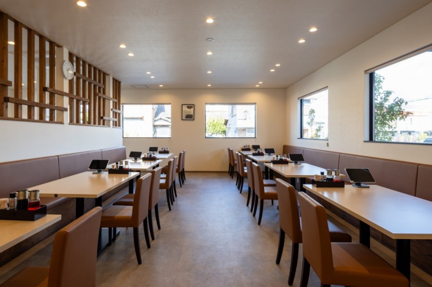 パーテーションが設けられた親しみやすい客席エリア